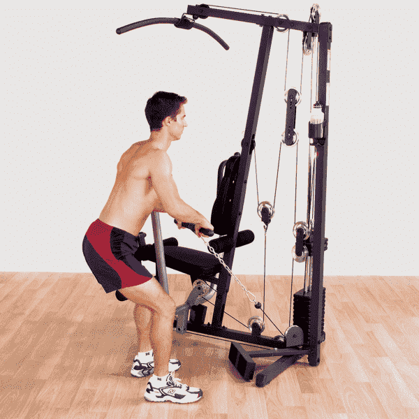 Man Using The Body-Solid G1S Home Gym