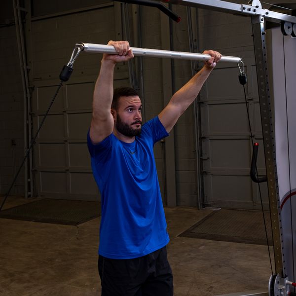 Man Using The Body-Solid Aluminum Double Swivel Bar