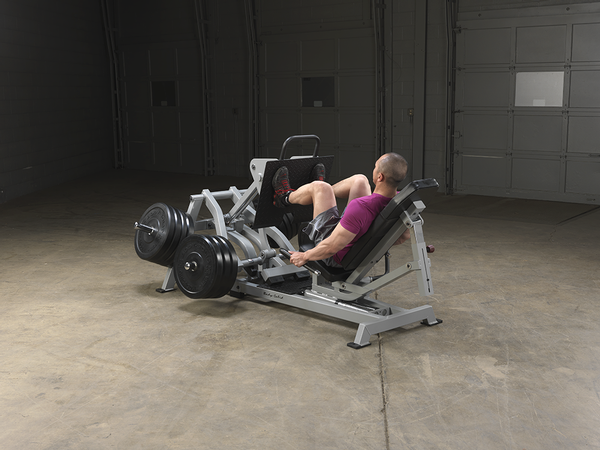 Man Using Body Solid Leverage Horizontal Leg Press