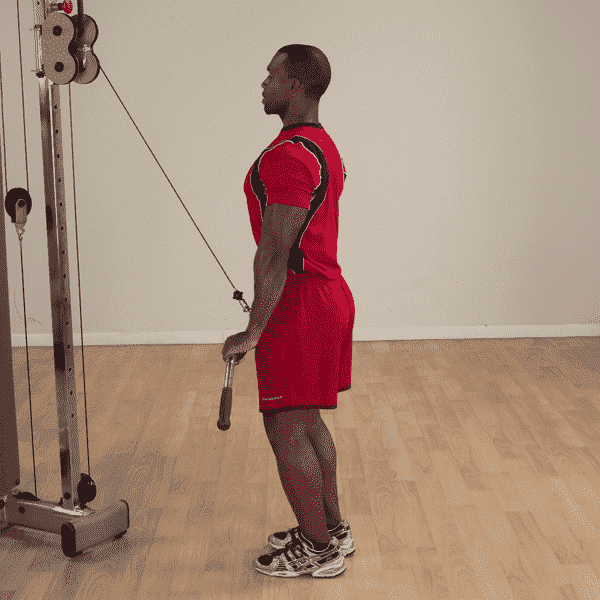 Man Using A Body Solid Pro-Grip Pro-Style Lat Bar Attachment in the Gym